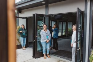 Front doors open / greeters / church family / outdoor church entranc